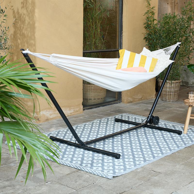 Hammock with frame colour sand in the garden