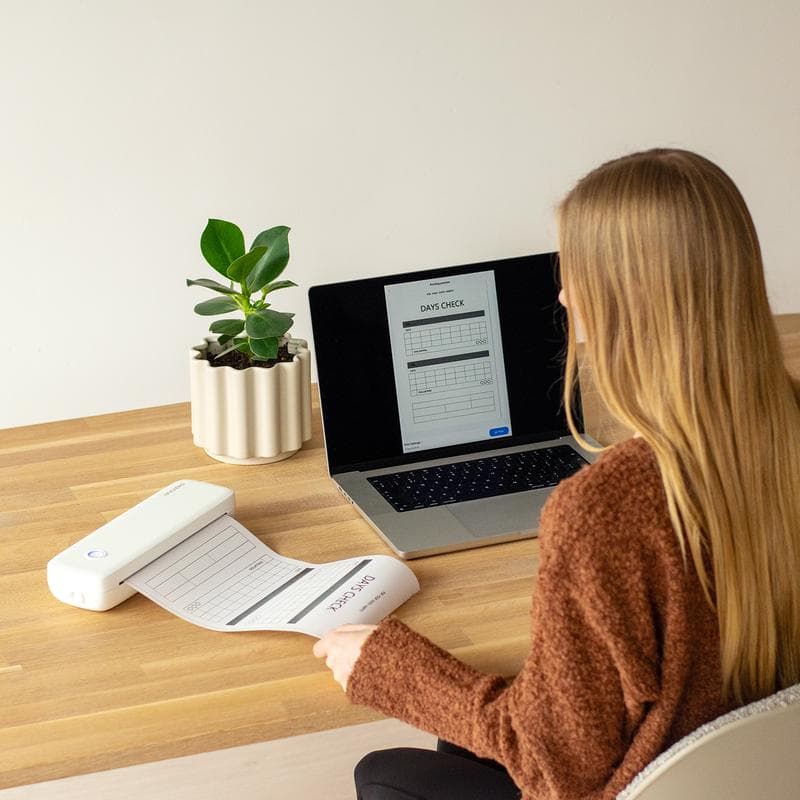 Printer in gebruik met laptop