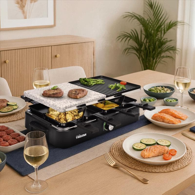 Appareil à raclette Tristar avec gril sur une table