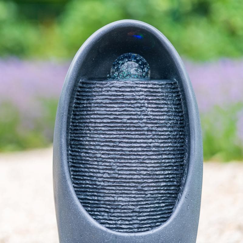 Fontein met lichteffect en draaiende bol