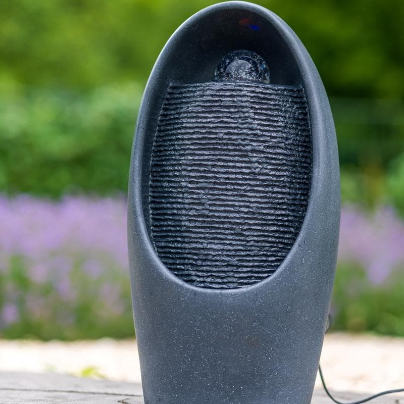 Fontein met lichteffect en draaiende bol