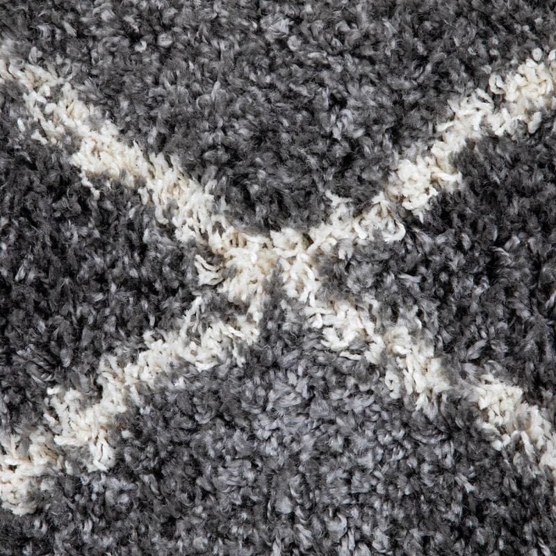 Tapis gris à losanges