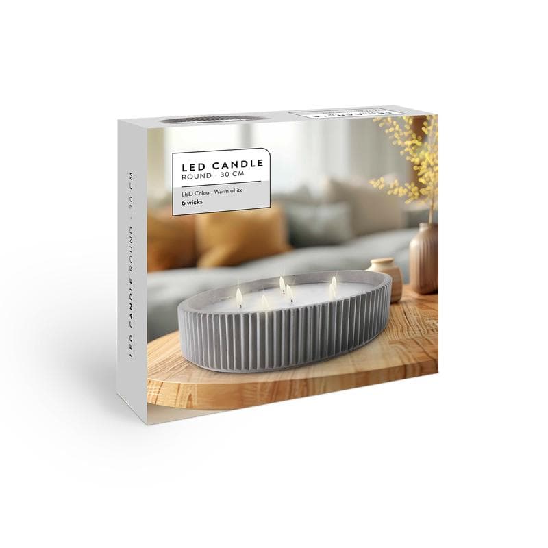 Ledkaars in cementen houder