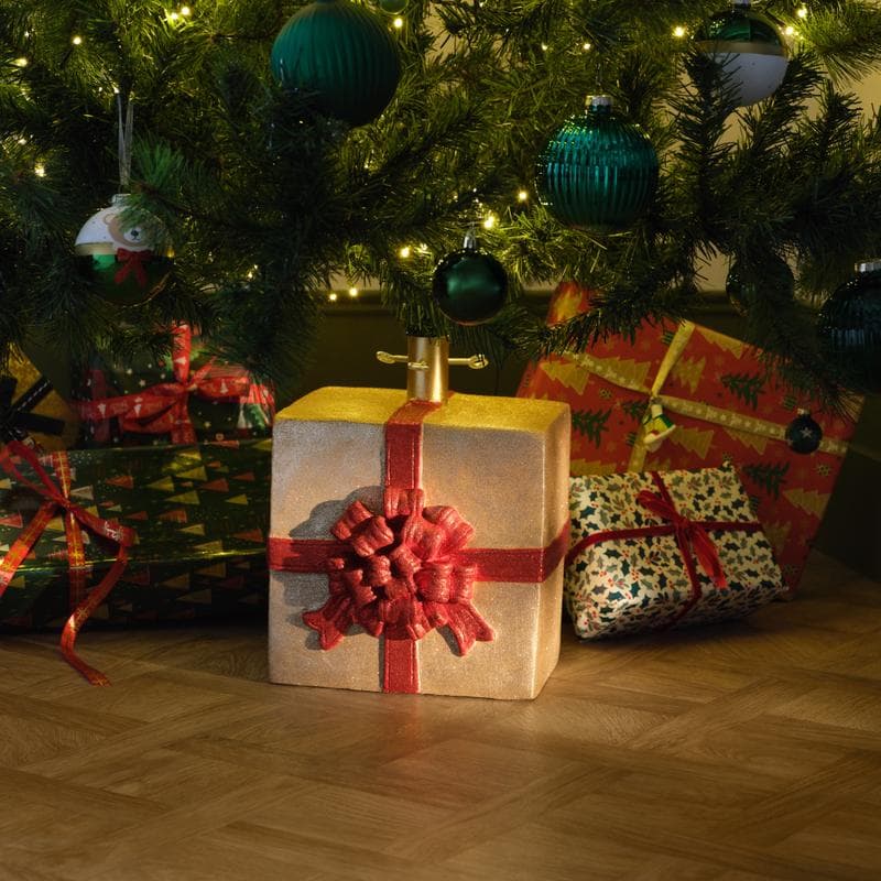 Kerstboomstandaard cadeau met strik sfeer