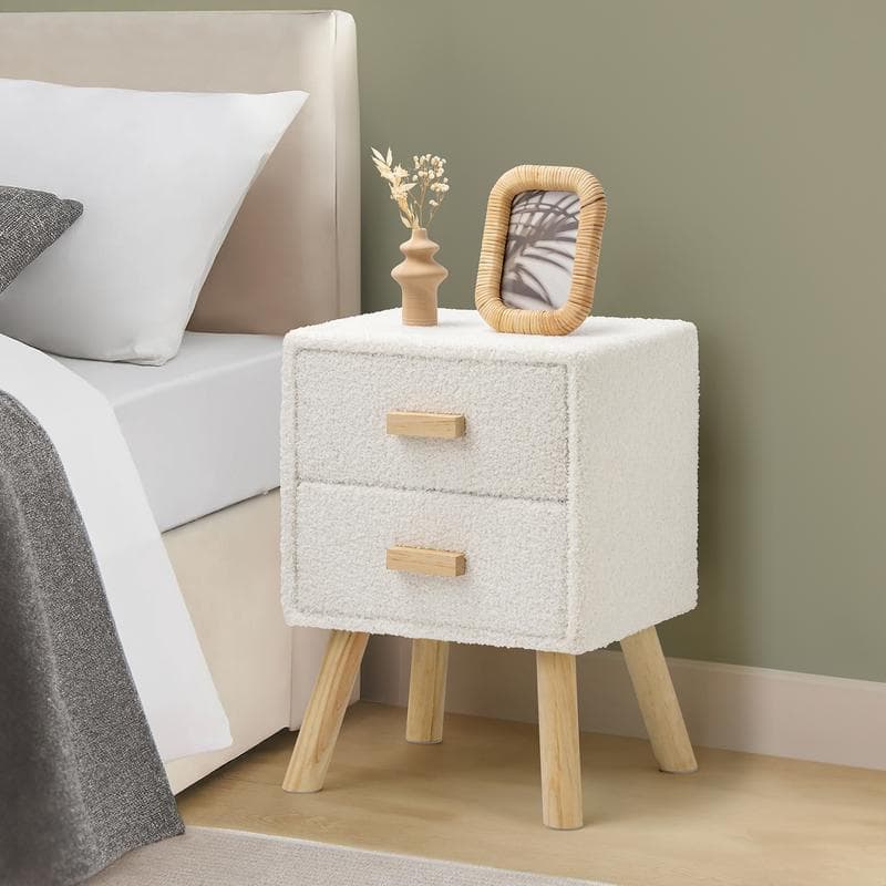 Nachtkastje boucle naast bed