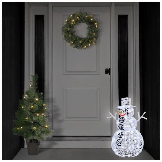 Lichtgevende sneeuwman voor de deur