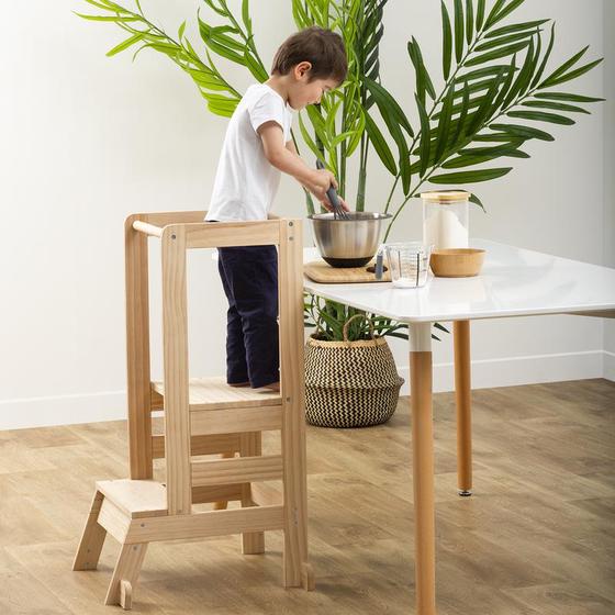 Wooden learning tower - at dining table