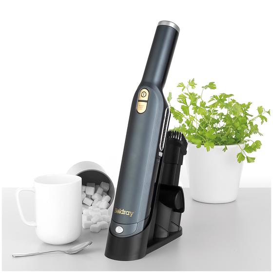 Multi-purpose handheld vacuum cleaner 10 on a tbale