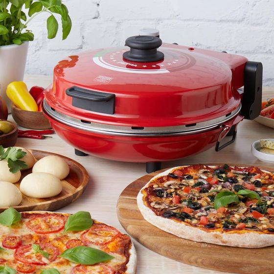 Petra electric pizza oven - in kitchen with pizzas