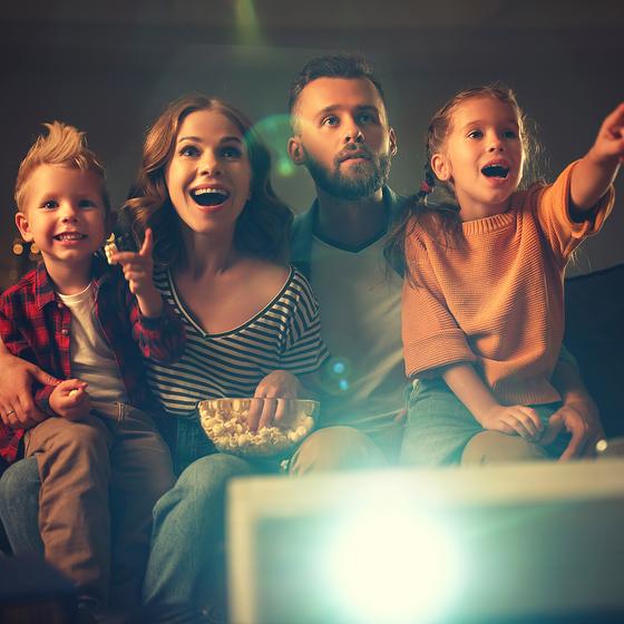 Watching a film with the whole family on the Nor-Tec projector