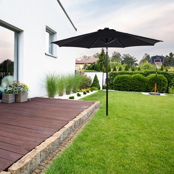 Parasol with solar lighting in the garden