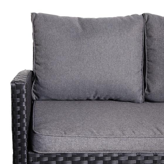 Cushion on the wicker sofa for 3 people