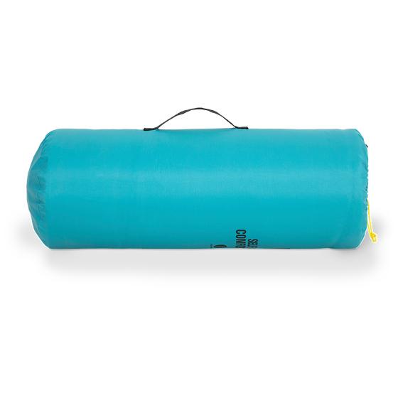Rolled up self-inflating air mattress in storage bag
