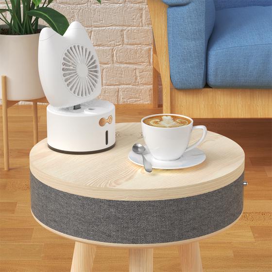 Design side table with built-in speaker mood picture with cup of coffee