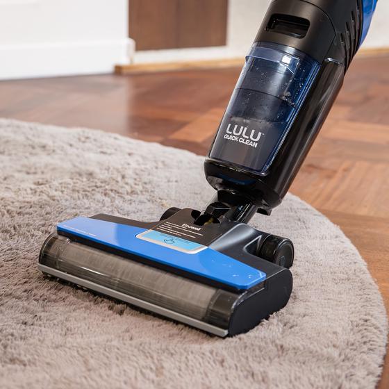 Ecowell wet/dry vacuum cleaner with mopping function in use on carpet