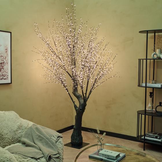 Light tree with gold-coloured LED lights - in corner of living room