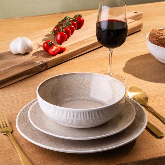 Dinner set with reactive glaze - sand - on the table