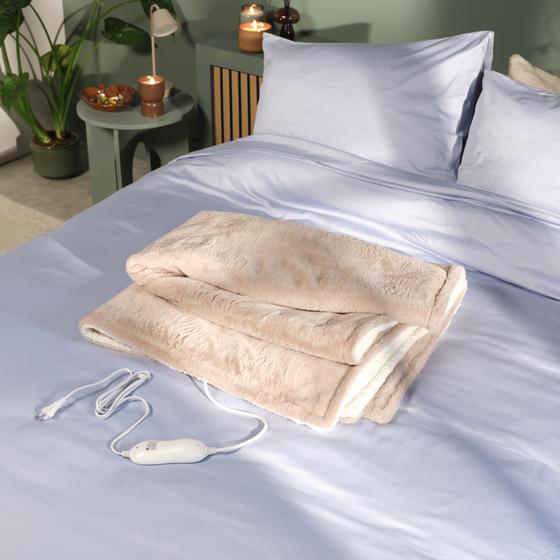 Carmen electric blanket - folded on bed with remote