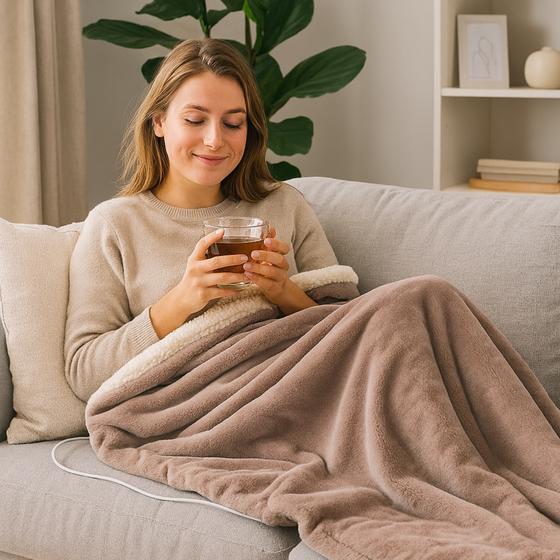 Carmen electric blanket - woman on couch