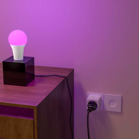 LSC Smart Connect plug in use with lamp on bedside table