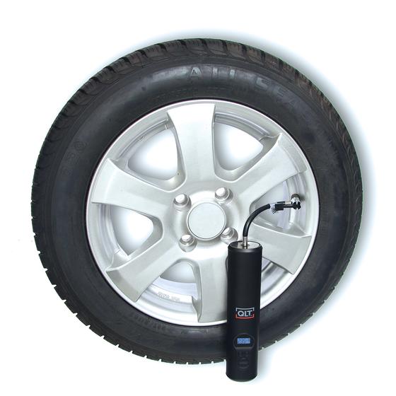 Cordless air compressor attached to a car tyre