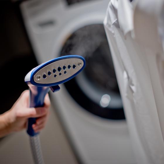 Clothing and fabric steamer focus on the head