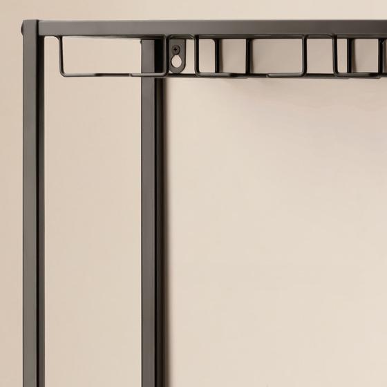 Wine cabinet with wine glass holders - close-up of wine glass holders