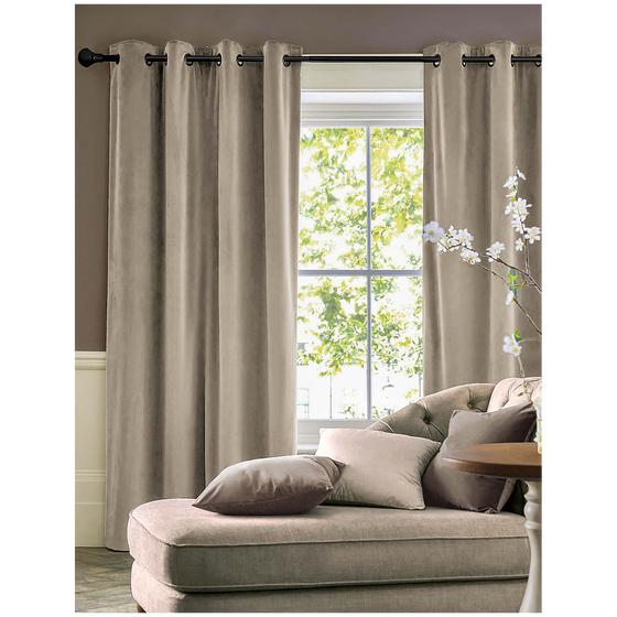 Gray-brown velvet curtains hang in the living room