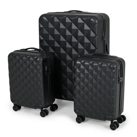The Spilbergen suitcase set along side each other