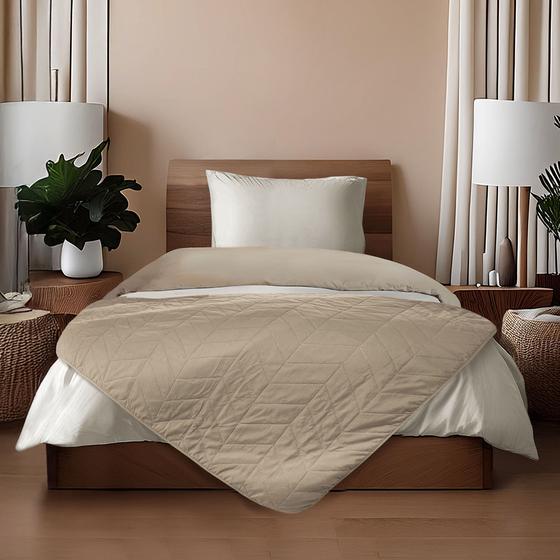 Dekbedovertrek met bedsprei op 1-persoons bed