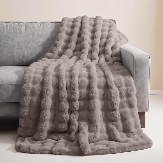Pompom Fur throw with cushions – taupe – plaid on couch