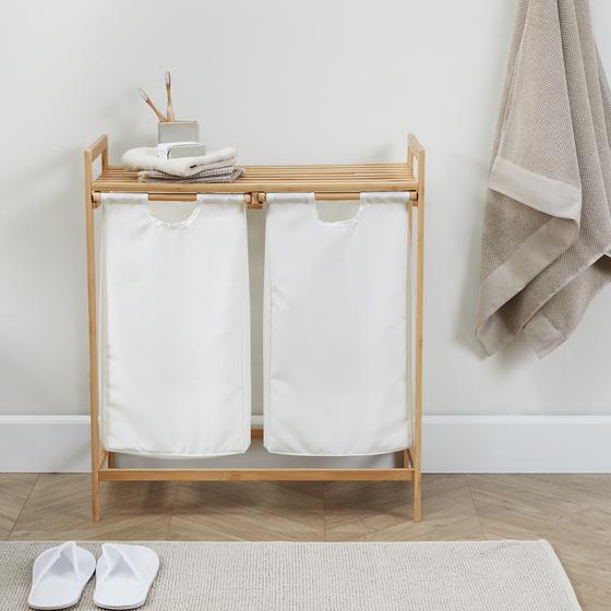 Bamboo laundry basket and rack in the bathroom
