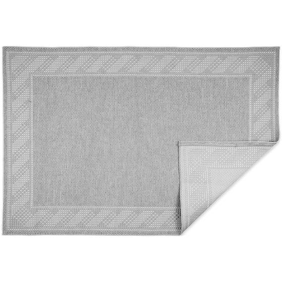 Outdoor rug gray which is folded