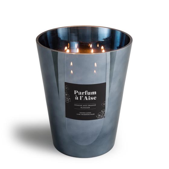 XL scented candle in luxurious holder lit