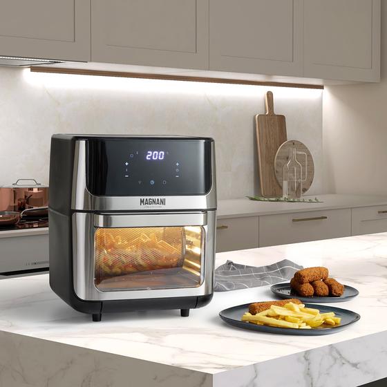 XXL air fryer with rotisserie function - on counter with snacks