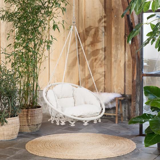Macramé hanging chair - in the garden