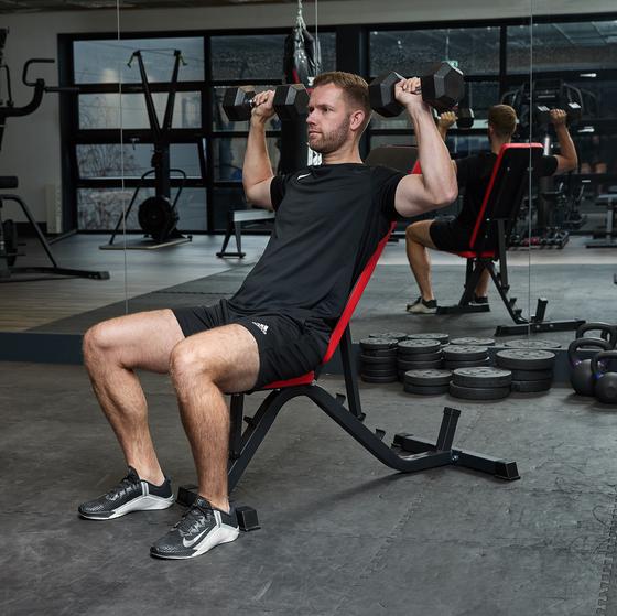 Banc de musculation polyvalent avec haltères