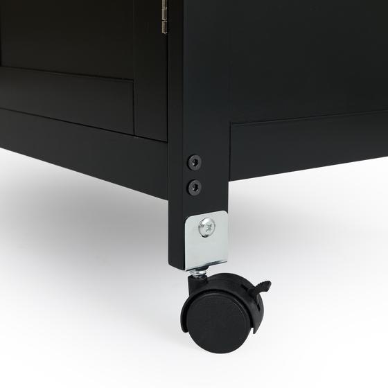 Kitchen trolley black on wheels - close-up of wheel