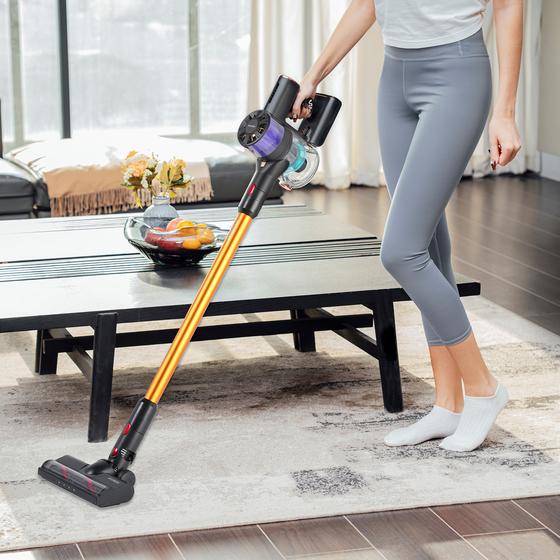 Vacuum cleaner in use on rug