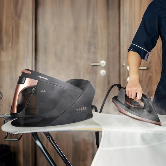 Hyundai steam iron in use with steam