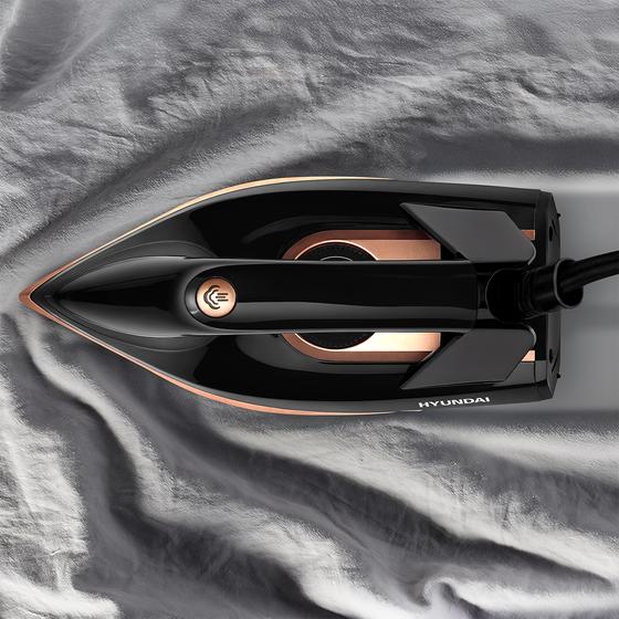 Hyundai steam iron in use viewed from above