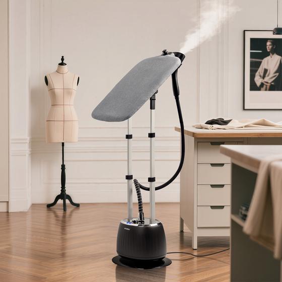Hyundai clothes steamer with ironing board - in use with steam