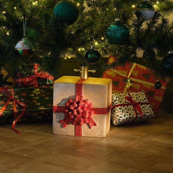 Kerstboomstandaard cadeau met strik sfeer