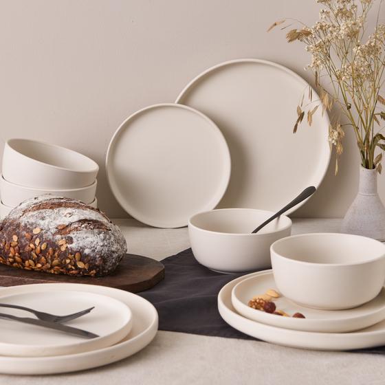 Cream white matte dinner set in use on table