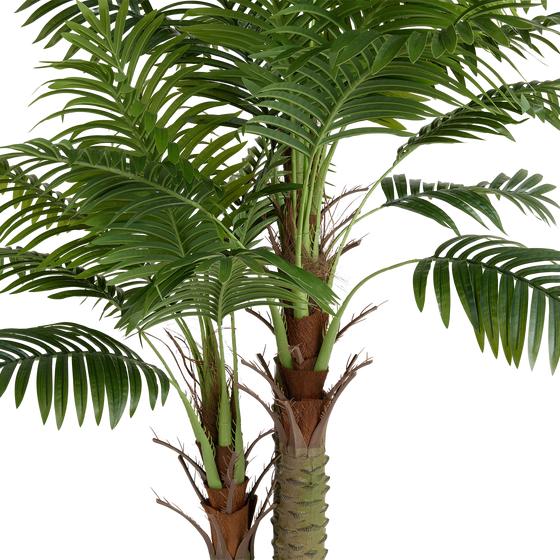 Artificial palm with trunks at varying heights