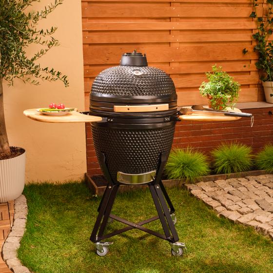 Kamado barbecue in use in garden - lifestyle image