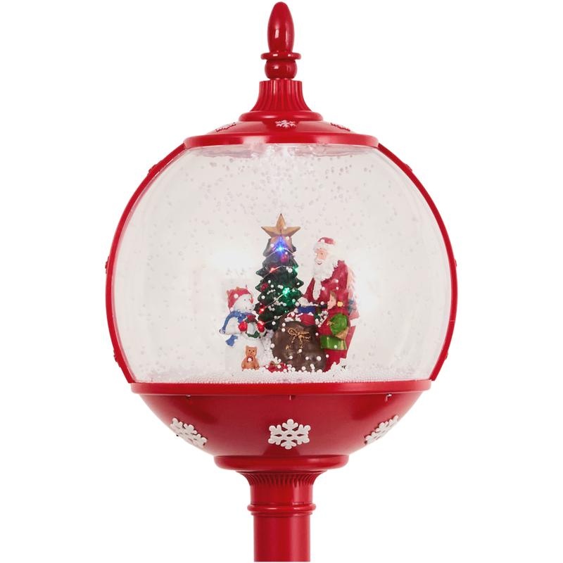 Christmas floor lamp with snow, light and sound - close-up