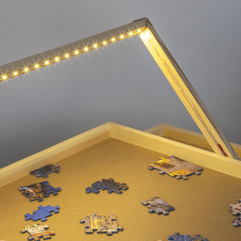 Puzzle table with LED lighting - mood picture with puzzle pieces