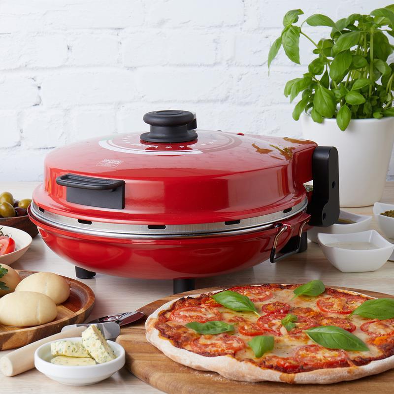 Petra electric pizza oven - in kitchen with pizza