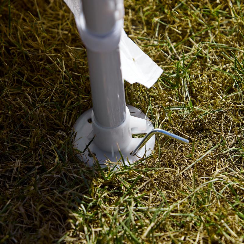 Party tent legs fixed in the ground